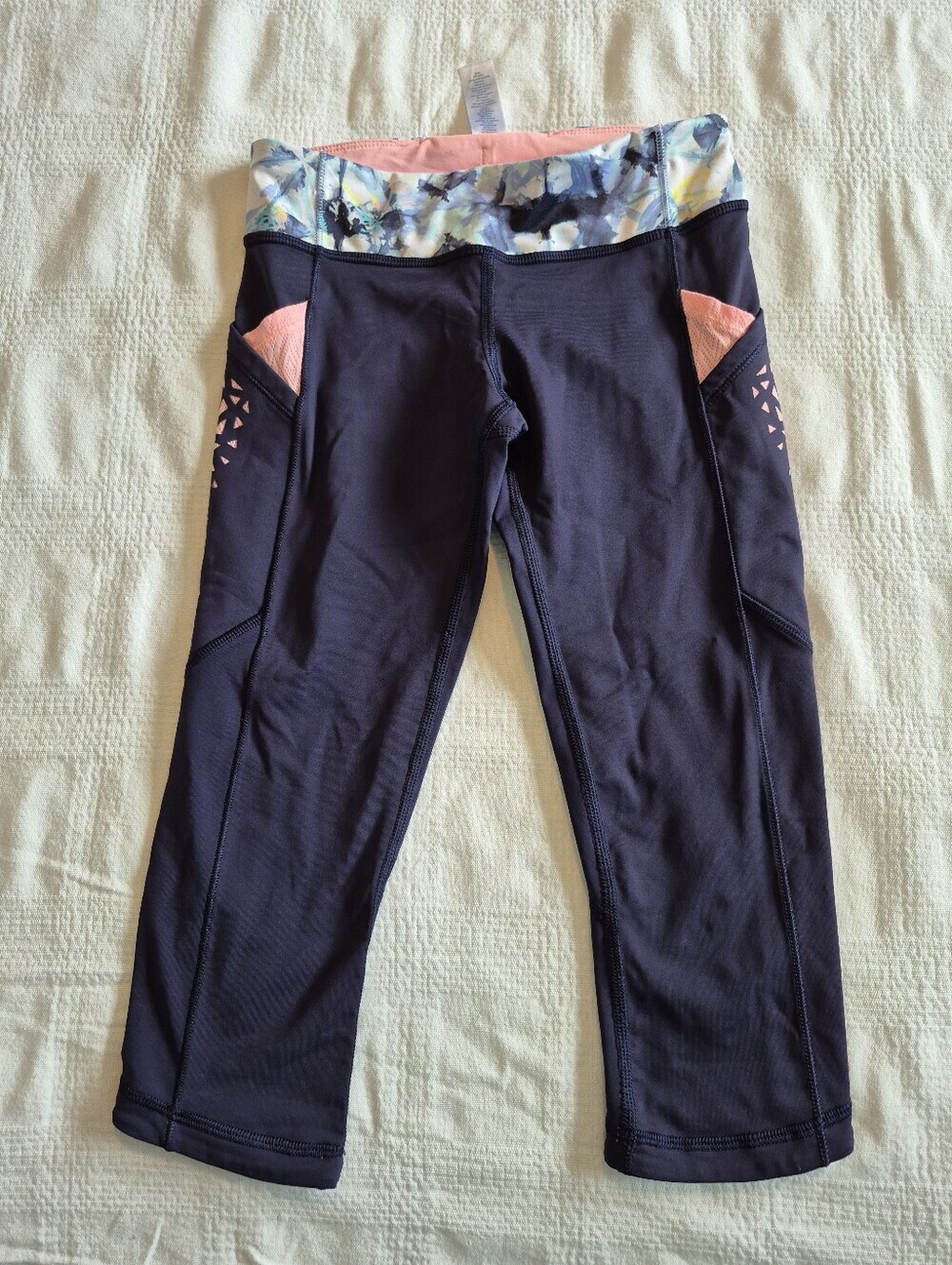 Ivivva girls size 8 blue cropped leggings cut out sides, multi color trim EUC